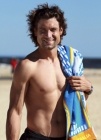 David Ferrer luce abdominales en las playas australianas