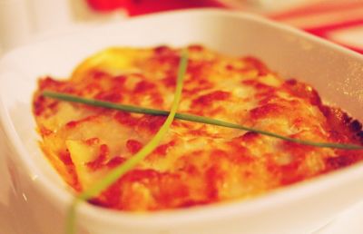 Gratín de patatas y calabacines con queso de cabra