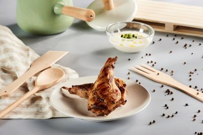 Muslos de conejo con yogur, pimienta y cilantro