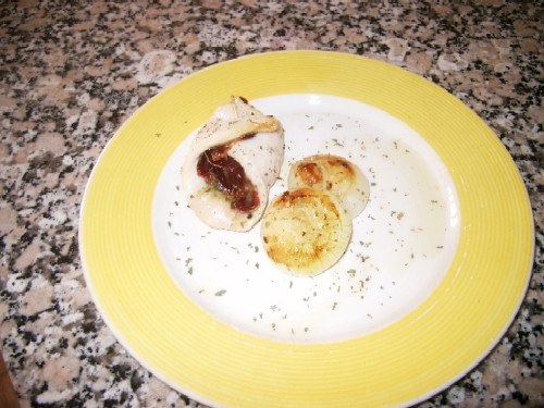 Saquitos de merluza a lo serrano